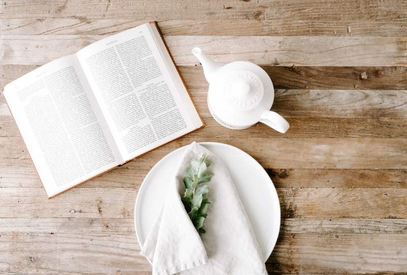 Open book on wood table